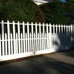 Unique white picket fence with 2 heights